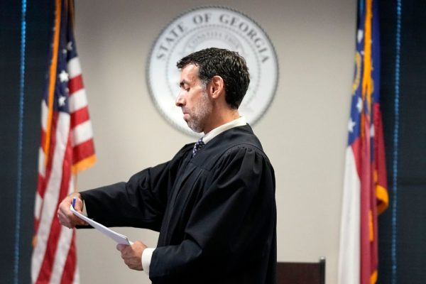 Georgia judge rejects Trump’s efforts to toss evidence in Fulton County probe and disqualify district